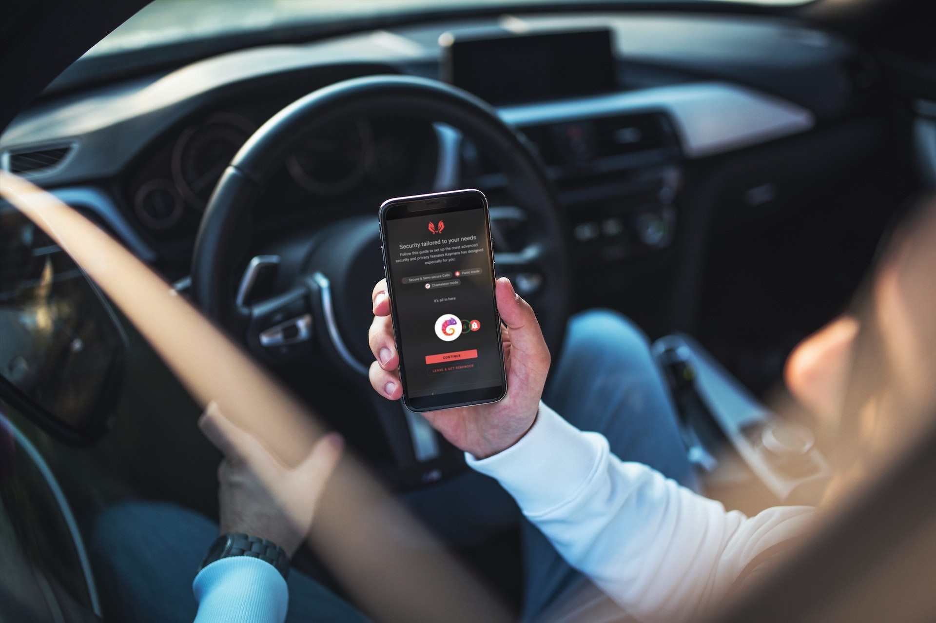 businessman holding kaymera smartphone